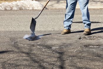 Pothole Filling in Chaska, Minnesota by JBX Sealcoating & Asphalt Maintenance