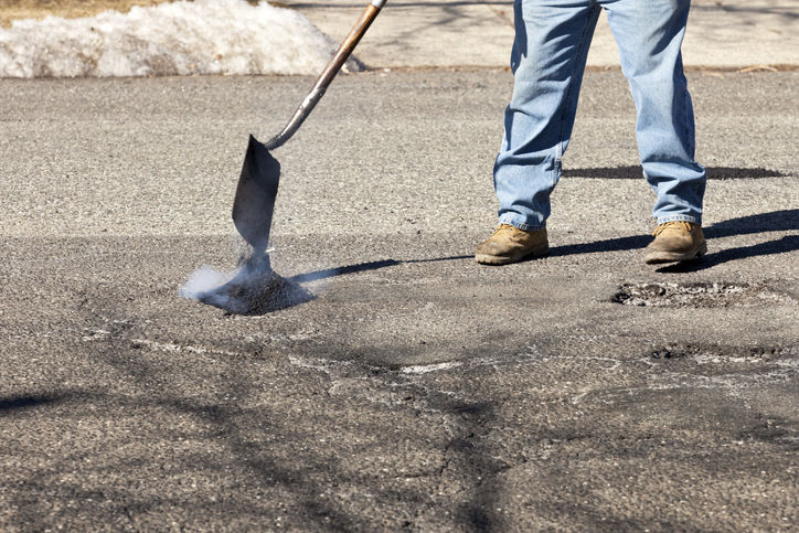Pothole Filling by JBX Sealcoating & Asphalt Maintenance